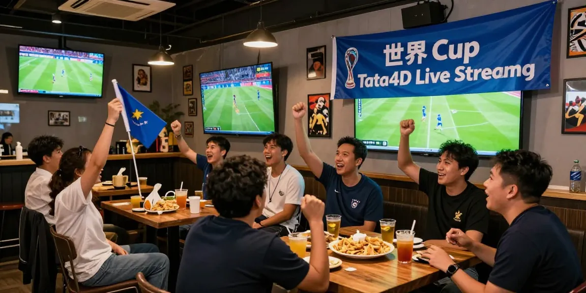 Streaming langsung Piala Dunia Tata4D dengan penggemar bersorak semangat, suasana pesta menonton yang meriah.